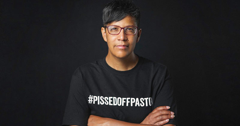 Kara Baylor in a black t-shirt with the hashtag pissedoffpastor printed on it