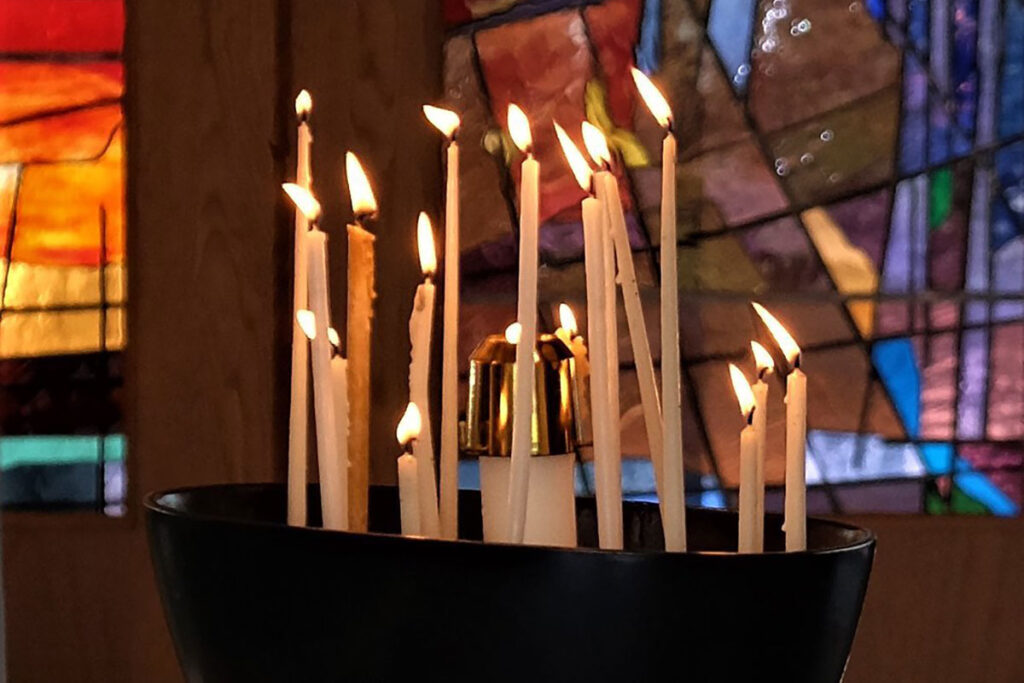 A bowl filled with sixteen candles in the Augustana Chapel
