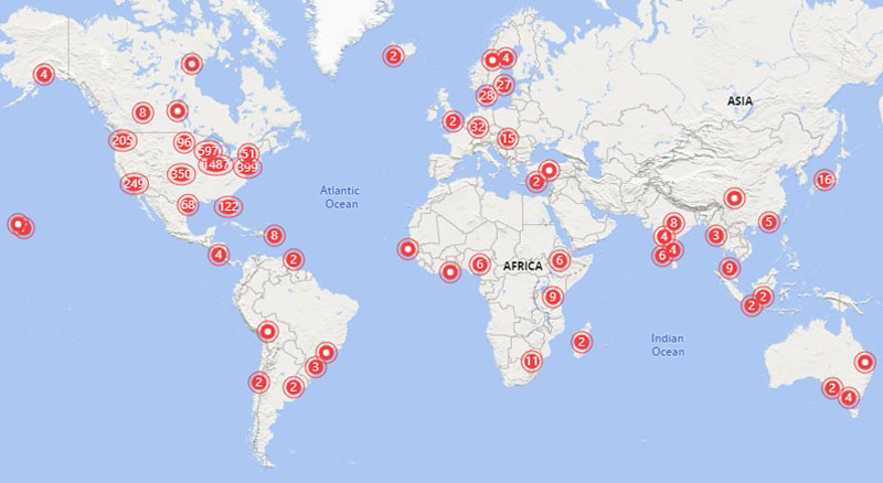 A map of the world showing the spread of LSTC alumni with red dots and numbers across six continents.