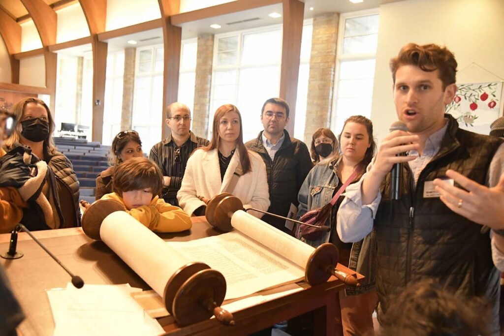 Kenneth showing the group the Torah