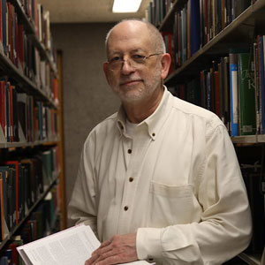 Barry C. Hopkins, Research Librarian in the library stacks