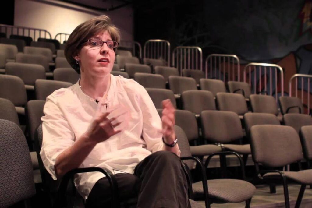 The Rev. Jen Nagel of Minneapolis speaks from auditorium seating