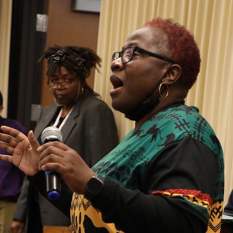 A woman speaking at a Pero Center for Intersectionality Studies event.