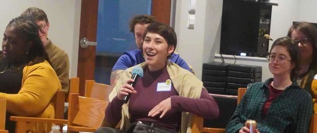 Student Liz Kuster asks a question during the Queer Symposium in the LSTC Chapel.