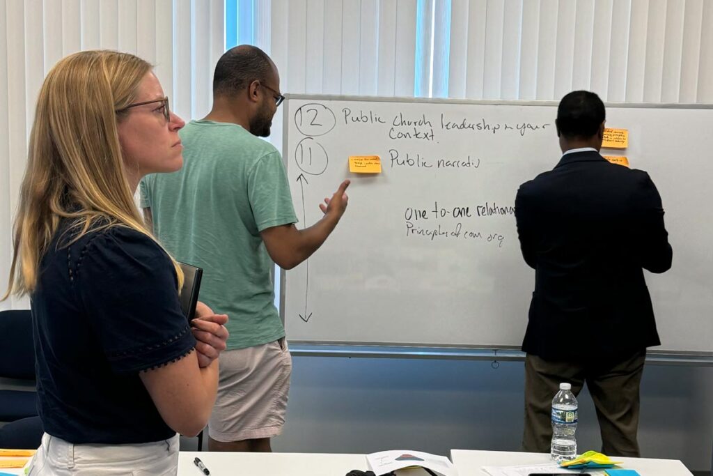 LSTC Faculty brainstorming the future of theological education on a whiteboard with Noodle, an educational services company.