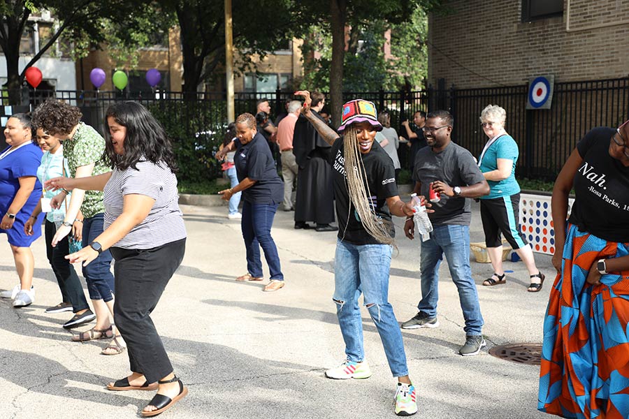 A group line dancing at the Better Together event.