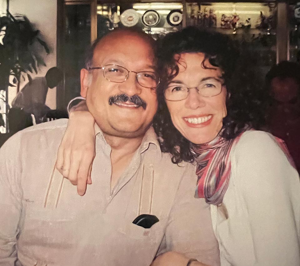 Rev. Dr. José David Rodríguez smiling with his wife Catalina.