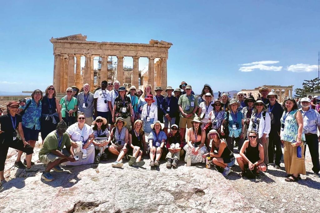 The LSTC student group takes a photo in front of the Parthenon in the the Acropolis of Athena in Athens.