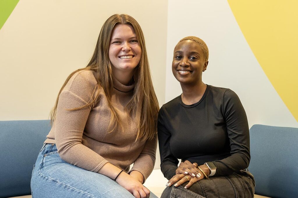 Lyndsay Monsen and Shemiah Curry posing in the LSTC lounge.