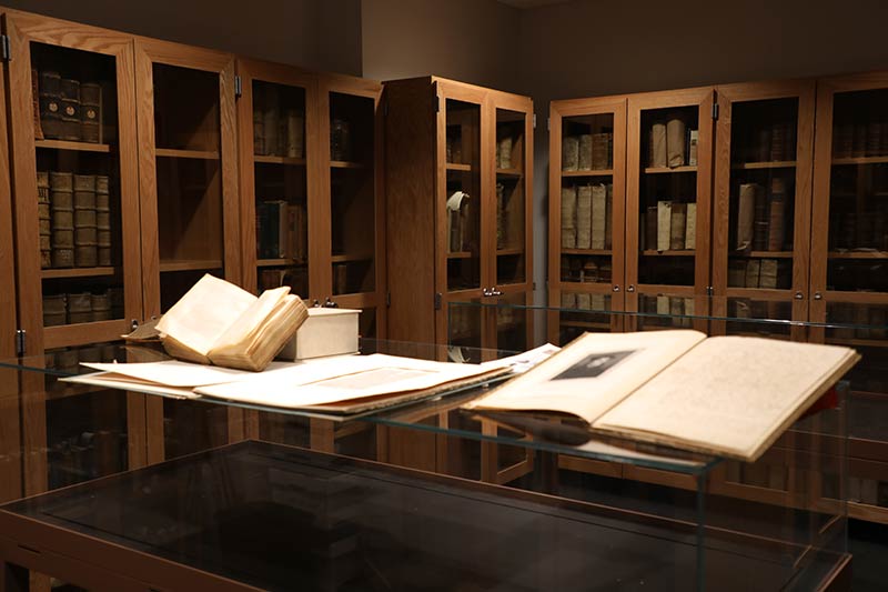 A display of open books in LSTC's Rare Books Room.