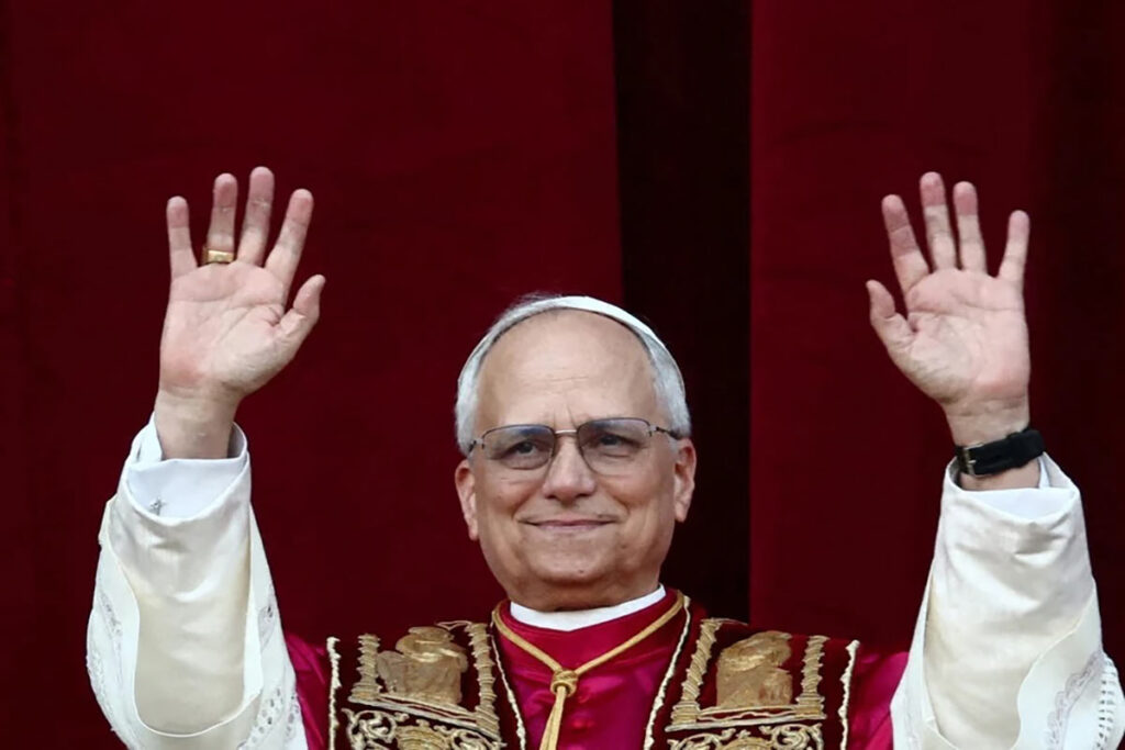 Pope Leo XIV, a Chicago Theological Union alum, waves to the crowd.
