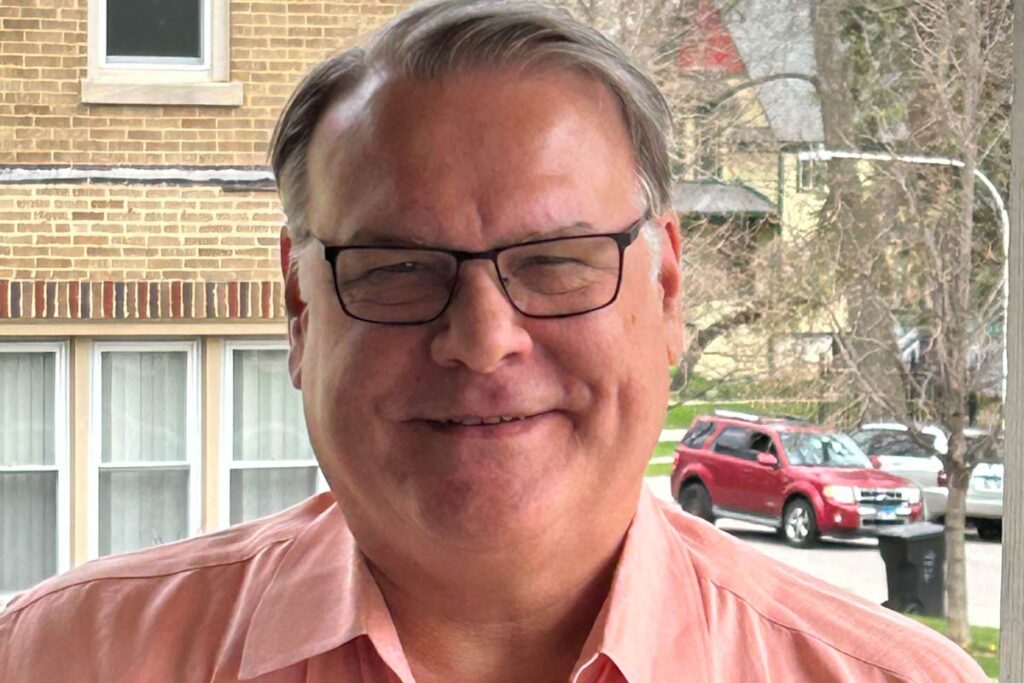 Tony Johnston smiling.