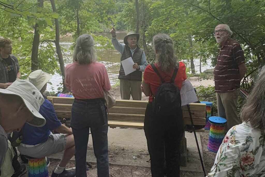 Friends, former students, and admirers of Dr. Joseph Sittler gather at Minnehaha Regional Park in Minneapolis to celebrate the life and enduring influence of renowned Lutheran theologian.