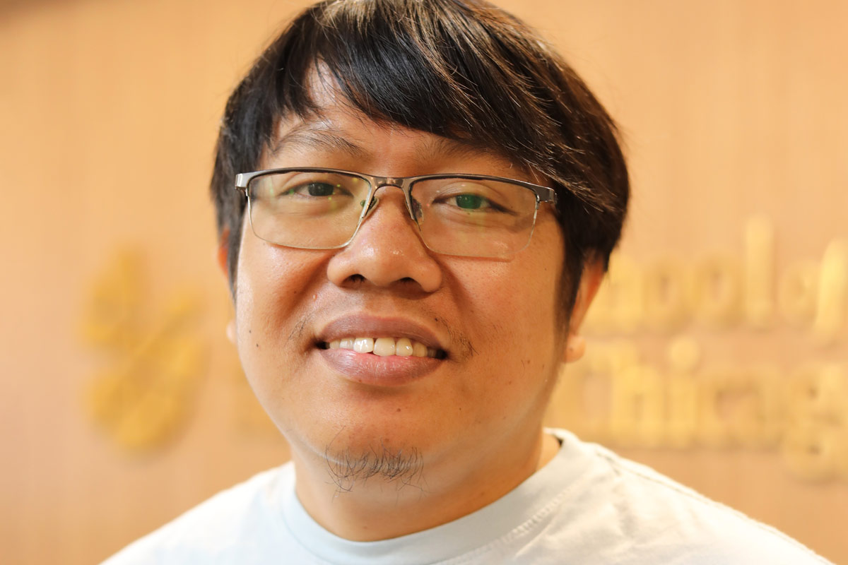 Headshot of Jan Purba.