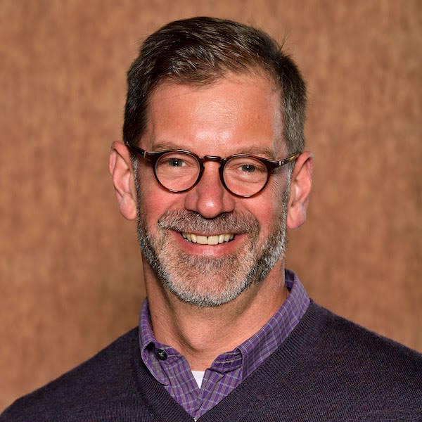 Headshot of Christian Scharen.