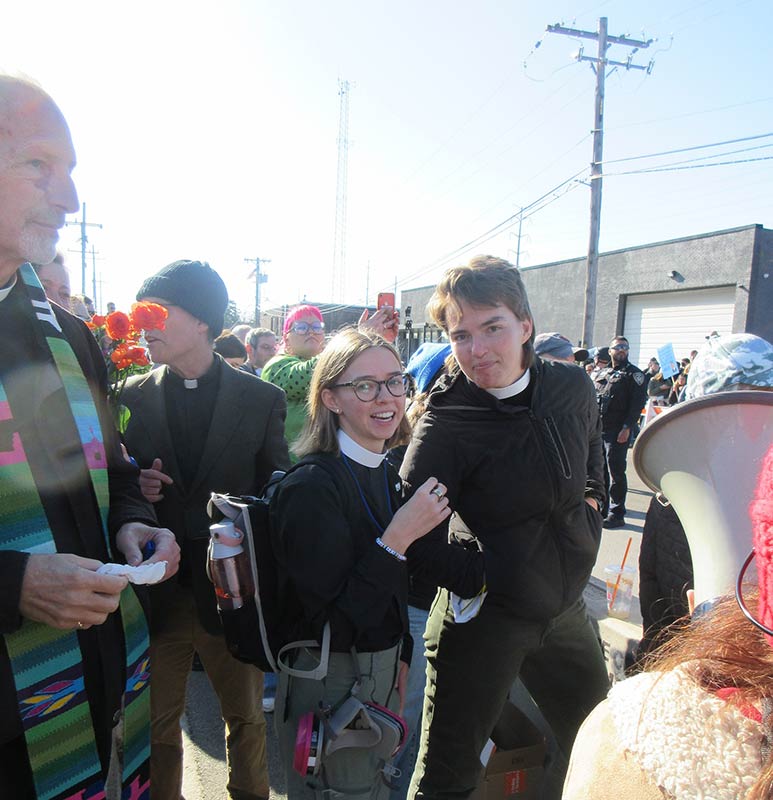 Students Liza Johnson (left) and Hannah Peterson (right) call for justice at the Broadview protest on November 14, 2025.