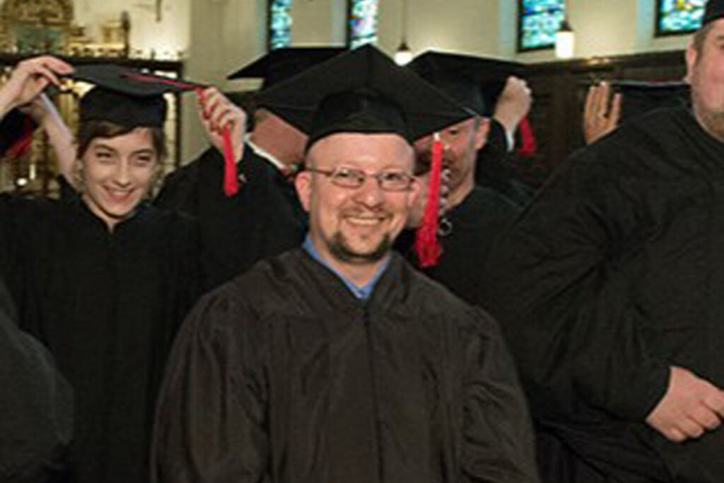 Deacon Steven Dickens at graduation.