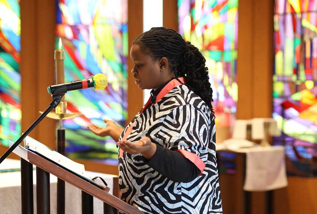 Student leading worship in the LSTC Chapel.