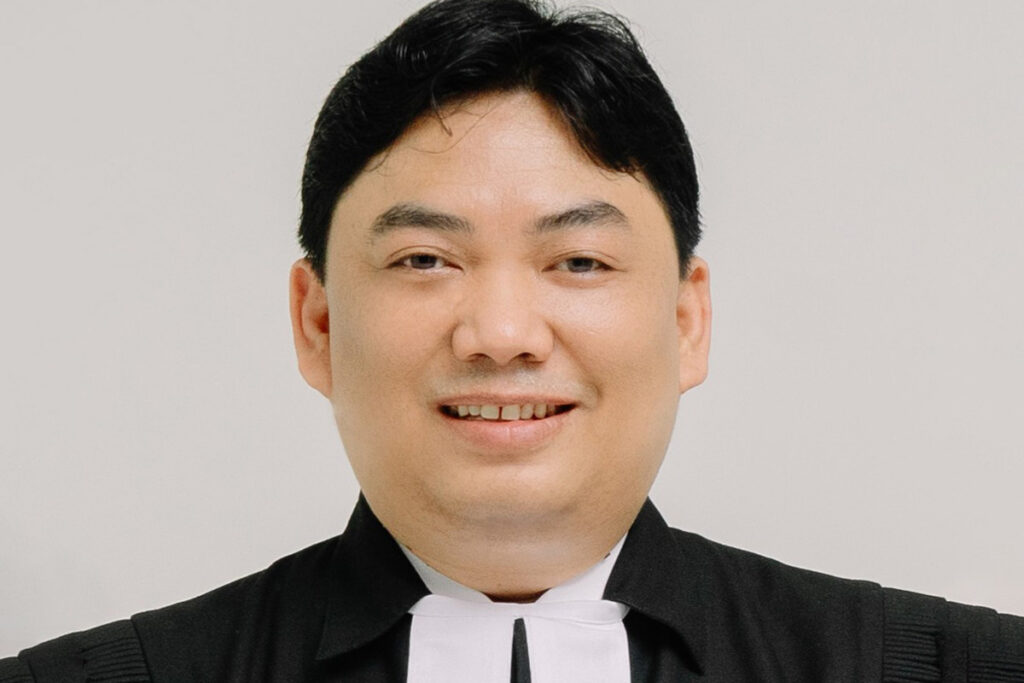 Headshot of Mangasa Parlindungan.