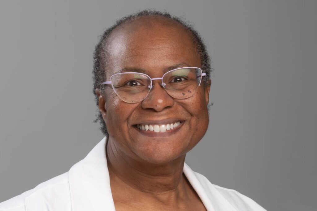 Headshot of Denise Rector.